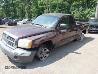 2005 Dodge Dakota SLT with VIN 1D7HE42N05S193871, listed as a IAAI auction lot 42587320 with 130,122 mi miles and . Bid and sale history available at DreamBid. Image 2.