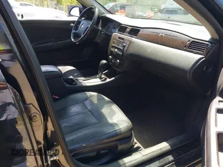 2012 Chevrolet Impala LTZ with VIN 2G1WC5E35C1168896, listed as a IAAI auction lot 42139845 with 158,732 mi miles and . Bid and sale history available at DreamBid. Image 5.