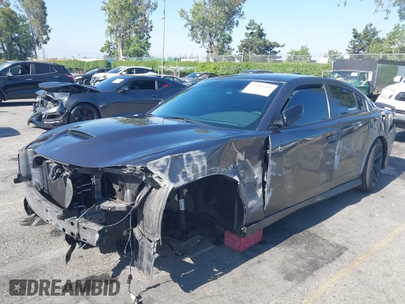 2019 Dodge Charger R/T z VIN 2C3CDXCT7KH527732, wystawiony jako IAAI lot #42283453 z przebiegiem 99 755 mil mil oraz . Historia ofert i sprzedaży dostępna na DreamBid. Obrazek 19.