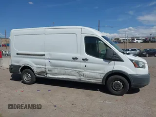 2016 Ford Transit Cargo z VIN 1FTYR2CG7GKB54149, wystawiony jako IAAI lot #41631962 z przebiegiem 151 824 mil mil oraz . Historia ofert i sprzedaży dostępna na DreamBid. Obrazek 13.