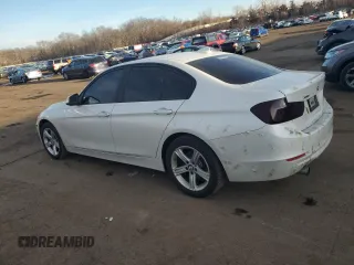 2015 BMW 3 Series 320i xDrive with VIN WBA3C3C5XFK202397, listed as a Copart auction lot 47146625 with 73,030 mi miles and Salvage Title. Bid and sale history available at carsss.com. Image 2.