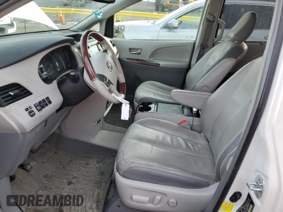 2012 Toyota Sienna XLE with VIN 5TDDK3DC2CS047193, listed as a Copart auction lot 46110715 with 152,047 mi miles and Salvage Title. Bid and sale history available at carsss.com. Image 7.