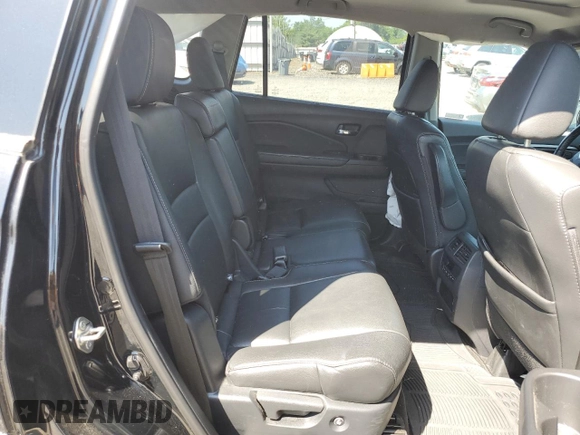 2019 Honda Pilot EX-L z VIN 5FNYF6H54KB089306, wystawiony jako Copart lot #62285325 z przebiegiem 101 352 mil mil oraz Szkoda całkowita • Salvage title. Historia ofert i sprzedaży dostępna na DreamBid. Obrazek 11.