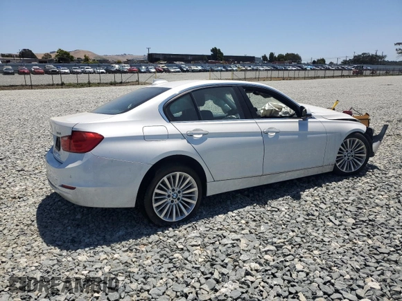 2014 BMW 3 Series 328i with VIN WBA3C1C53EK112799, listed as a Copart auction lot 61493585 with Not provided miles and Salvage title. Bid and sale history available at DreamBid. Image 3.