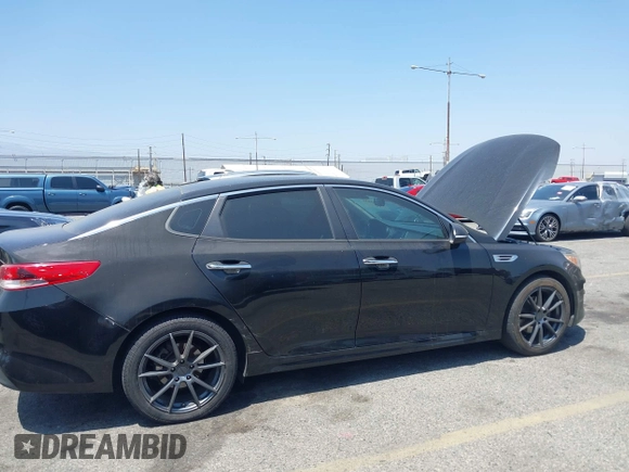 2016 Kia Optima LX with VIN 5XXGT4L3XGG008098, listed as a IAAI auction lot 42355830 with 203,517 mi miles and . Bid and sale history available at DreamBid. Image 13.