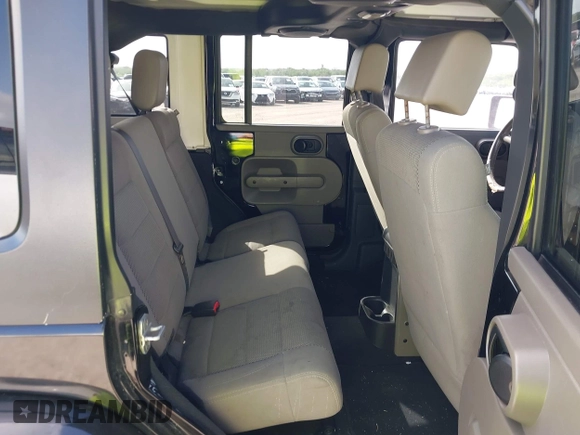 2007 Jeep Wrangler Unlimited Sahara with VIN 1J4GA59187L187656, listed as a IAAI auction lot 42554114 with 200,840 mi miles and . Bid and sale history available at DreamBid. Image 8.
