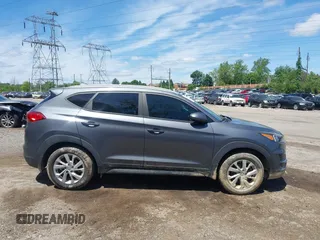 2019 Hyundai Tucson Value z VIN KM8J3CA48KU066849, wystawiony jako IAAI lot #42310360 z przebiegiem 36 423 mil mil oraz . Historia ofert i sprzedaży dostępna na DreamBid. Obrazek 13.