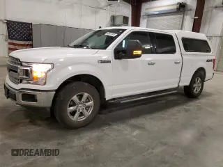 2019 Ford F-150 XL with VIN 1FTFW1E4XKKE37635, listed as a Copart auction lot 60041045 with 76,328 mi miles and Salvage title. Bid and sale history available at DreamBid. Image 1.