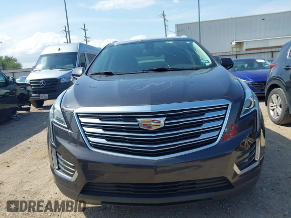 2018 Cadillac XT5 Luxury AWD z VIN 1GYKNDRS0JZ209266, wystawiony jako IAAI lot #42454536 z przebiegiem 52 839 mil mil oraz . Historia ofert i sprzedaży dostępna na DreamBid. Obrazek 12.