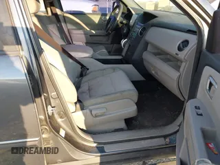 2010 Honda Pilot EX with VIN 5FNYF3H44AB006218, listed as a IAAI auction lot 41649588 with 209,830 mi miles and . Bid and sale history available at carsss.com. Image 5.