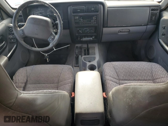 1998 Jeep Cherokee Sport with VIN 1J4FJ68S9WL249365, listed as a Copart auction lot 58896155 with 344,530 mi miles and Clean title. Bid and sale history available at DreamBid. Image 8.