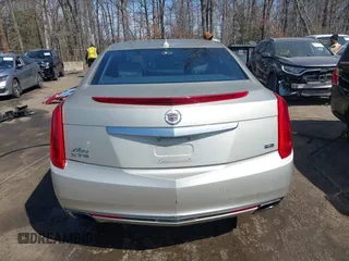 2013 Cadillac XTS Platinum z VIN 2G61U5S37D9209926, wystawiony jako IAAI lot #41754716 z przebiegiem 126 239 mil mil oraz . Historia ofert i sprzedaży dostępna na DreamBid. Obrazek 16.