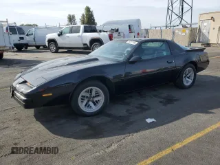 1988 Pontiac Firebird z VIN 1G2FS2184JL250544, wystawiony jako Copart lot #78311144 z przebiegiem 120 606 mil mil oraz Czysty tytuł • Clean title. Historia ofert i sprzedaży dostępna na DreamBid. Obrazek 1.
