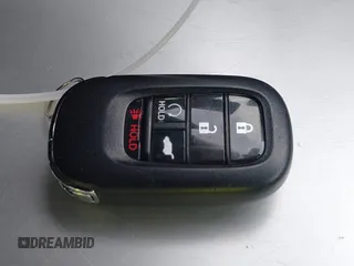 2023 Honda Civic Sport z VIN 19XFL2H89PE001737, wystawiony jako IAAI lot #41689390 z przebiegiem 24 869 mil mil oraz . Historia ofert i sprzedaży dostępna na DreamBid. Obrazek 11.