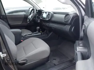 2022 Toyota Tacoma SR with VIN 3TYAX5GN8NT066318, listed as a IAAI auction lot 41739981 with 50,186 mi miles and . Bid and sale history available at DreamBid. Image 5.