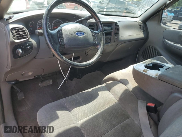 2003 Ford F-150 XL with VIN 1FTRF17W83NA54398, listed as a Copart auction lot 58680304 with 164,874 mi miles and Salvage Title. Bid and sale history available at DreamBid. Image 8.
