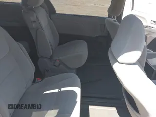2015 Toyota Sienna LE AAS with VIN 5TDKK3DC1FS599053, listed as a IAAI auction lot 42216805 with 167,280 mi miles and . Bid and sale history available at DreamBid. Image 8.