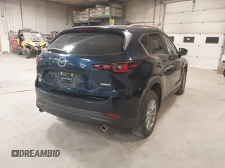 2023 Mazda CX-5 2.5 S Carbon Edition with VIN JM3KFBCM4P0289998, listed as a IAAI auction lot 41297074 with 19,303 mi miles. Bid and sale history available at carsss.com. Image 4.
