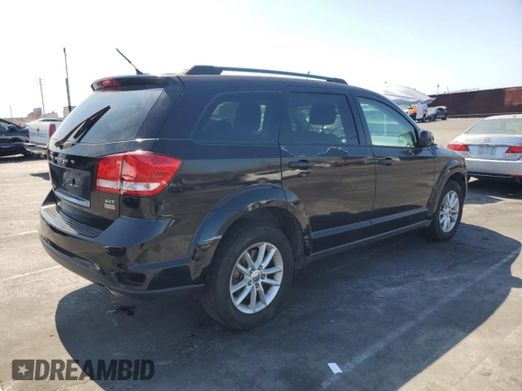 2015 Dodge Journey SXT with VIN 3C4PDCBG6FT718131, listed as a Copart auction lot 62214265 with 108,986 mi miles and Salvage title. Bid and sale history available at DreamBid. Image 3.