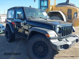 2021 Jeep Wrangler Sport with VIN 1C4GJXAG8MW559296, listed as a IAAI auction lot 41759848 with 47,374 mi miles and . Bid and sale history available at DreamBid. Image 1.
