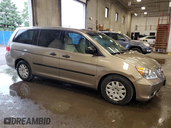 2009 Honda Odyssey LX with VIN 5FNRL38259B018546, listed as a Copart auction lot 62142015 with 162,459 mi miles and Salvage title. Bid and sale history available at DreamBid. Image 4.
