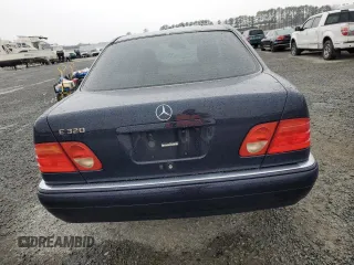 1997 Mercedes-Benz E-Class with VIN WDBJF55FXVJ027722, listed as a Copart auction lot 44835585 with 0 mi miles and Salvage Title. Bid and sale history available at carsss.com. Image 6.