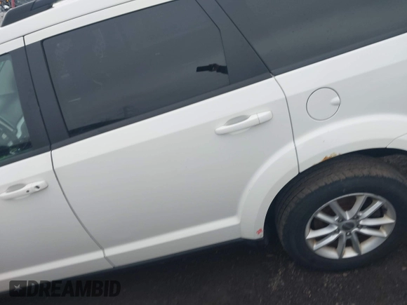 2014 Dodge Journey SXT with VIN 3C4PDCBB8ET153190, listed as a IAAI auction lot 41854655 with 153,048 mi miles and . Bid and sale history available at DreamBid. Image 14.