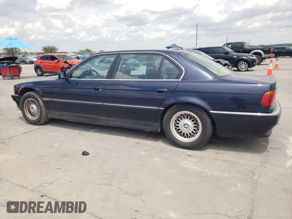 1997 BMW 7 Series 740il with VIN WBAGJ8324VDM02317, listed as a Copart auction lot 64879564 with 107,365 mi miles and Salvage Title. Bid and sale history available at carsss.com. Image 2.