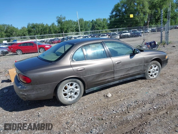 2001 Oldsmobile Intrigue GX z VIN 1G3WH52H11F148269, wystawiony jako IAAI lot #42238449 z przebiegiem Nie podano mil oraz . Historia ofert i sprzedaży dostępna na DreamBid. Obrazek 4.