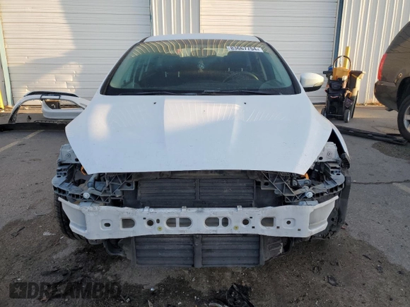 2017 Ford Focus SE with VIN 1FADP3F27HL226219, listed as a Copart auction lot 83667754 with 124,026 mi miles and Salvage Title. Bid and sale history available at carsss.com. Image 5.