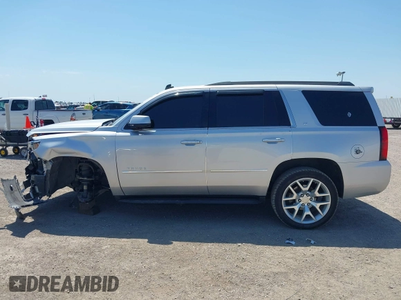 2015 Chevrolet Tahoe LT with VIN 1GNSCBKC6FR303850, listed as a IAAI auction lot 42254115 with 147,856 mi miles and . Bid and sale history available at DreamBid. Image 14.