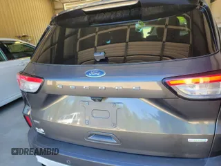2020 Ford Escape SE with VIN 1FMCU0G60LUB83744, listed as a IAAI auction lot 42143155 with 84,968 mi miles. Bid and sale history available at carsss.com. Image 1.
