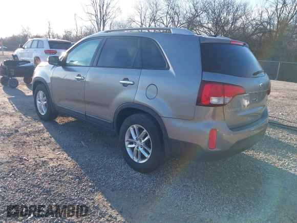 2014 Kia Sorento LX with VIN 5XYKT3A63EG503284, listed as a IAAI auction lot 41814383 with 166,219 mi miles and . Bid and sale history available at DreamBid. Image 3.