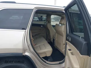 2014 Jeep Grand Cherokee Limited z VIN 1C4RJFBG8EC408754, wystawiony jako IAAI lot #42612211 z przebiegiem 149 017 mil mil oraz . Historia ofert i sprzedaży dostępna na DreamBid. Obrazek 8.