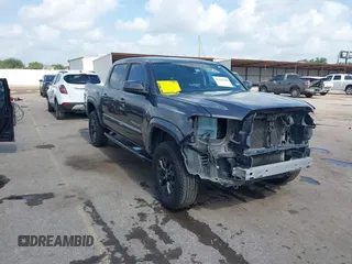 2021 Toyota Tacoma SR with VIN 3TYAX5GNXMT012484, listed as a IAAI auction lot 42429068 with 105,555 mi miles and . Bid and sale history available at DreamBid. Image 1.
