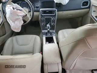 2016 Volvo V60 T5 Drive-E Premier z VIN YV140MEK3G1316185, wystawiony jako Copart lot #49115635 z przebiegiem 76 199 mil mil oraz Szkody całkowita. Historia ofert i sprzedaży dostępna na DreamBid. Obrazek 8.