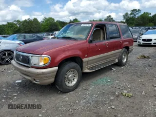 2000 Mercury Mountaineer with VIN 4M2ZU86P2YUJ30049, listed as a Copart auction lot 58619545 with 149,673 mi miles and Salvage title. Bid and sale history available at DreamBid. Image 1.