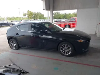 2021 Mazda Mazda3 Hatchback 2.5 S with VIN JM1BPAJL5M1338061, listed as a IAAI auction lot 40765593 with 52,958 mi miles. Bid and sale history available at carsss.com. Image 14.