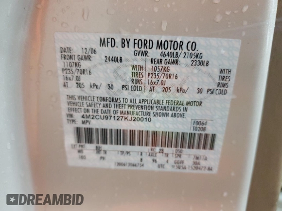 2007 Mercury Mariner Premier with VIN 4M2CU97127KJ20010, listed as a Copart auction lot 52123205 with 162,337 mi miles and Salvage title. Bid and sale history available at DreamBid. Image 13.