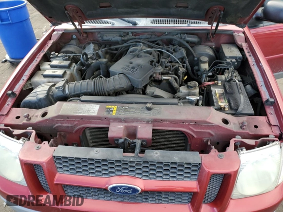 2003 Ford Explorer Sport XLS z VIN 1FMZU70E93UC11352, wystawiony jako Copart lot #84494984 z przebiegiem 188 874 mil mil oraz Szkoda całkowita • Salvage title. Historia ofert i sprzedaży dostępna na DreamBid. Obrazek 11.