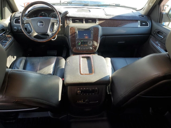 2009 GMC Yukon Denali z VIN 1GKFK03229R283189, wystawiony jako Copart lot #58702855 z przebiegiem 212 195 mil mil oraz Czysty tytuł • Clean title. Historia ofert i sprzedaży dostępna na DreamBid. Obrazek 8.