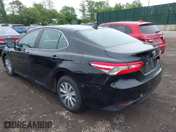 2019 Toyota Camry Hybrid LE z VIN 4T1B31HK5KU510055, wystawiony jako IAAI lot #42325522 z przebiegiem 97 000 mil mil oraz . Historia ofert i sprzedaży dostępna na DreamBid. Obrazek 3.