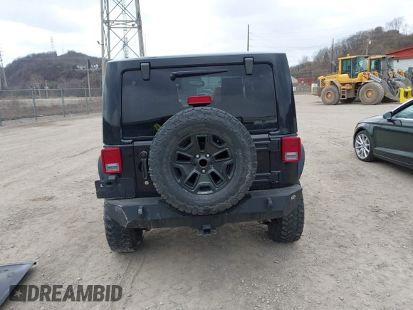 2014 Jeep Wrangler Sahara with VIN 1C4AJWBG9EL311477, listed as a IAAI auction lot 41884255 with 82,221 mi miles and . Bid and sale history available at carsss.com. Image 17.