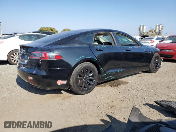 2016 Tesla Model S 90D with VIN 5YJSA1E20GF169954, listed as a Copart auction lot 61974475 with 124,560 mi miles and Salvage title. Bid and sale history available at DreamBid. Image 3.