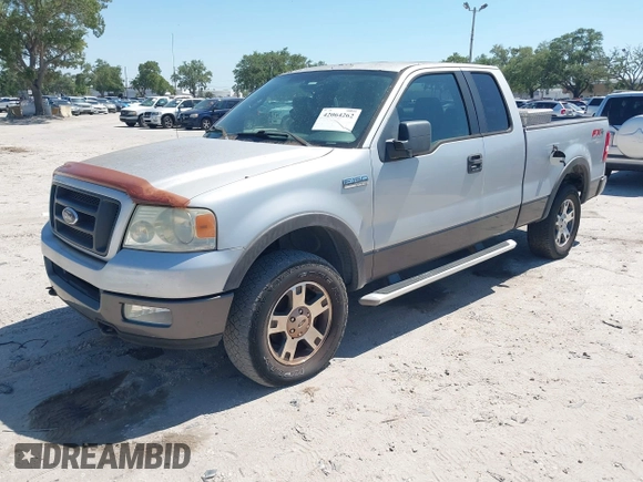 2005 Ford F-150 XLT with VIN 1FTPX14565KC84798, listed as a IAAI auction lot 42064262 with 149,534 mi miles. Bid and sale history available at carsss.com. Image 2.