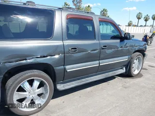 2003 Chevrolet Suburban LS with VIN 3GNEC16T63G115908, listed as a IAAI auction lot 41950165 with 202,075 mi miles. Bid and sale history available at carsss.com. Image 6.