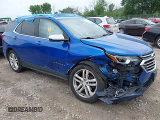 2019 Chevrolet Equinox Premier z VIN 3GNAXYEXXKS538874, wystawiony jako IAAI lot #42524837 z przebiegiem 101 741 mil mil oraz . Historia ofert i sprzedaży dostępna na DreamBid. Obrazek 1.