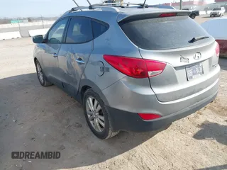 2013 Hyundai Tucson GLS with VIN KM8JU3AC0DU572232, listed as a IAAI auction lot 41724332 with 232,661 mi miles. Bid and sale history available at carsss.com. Image 3.