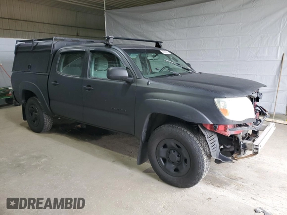 2009 Toyota Tacoma with VIN 3TMLU42N09M033351, listed as a Copart auction lot 48962095 with 184,289 mi miles and Salvage Title. Bid and sale history available at DreamBid. Image 4.
