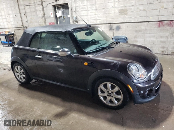 2015 MINI Convertible z VIN WMWZN3C59FT266929, wystawiony jako Copart lot #57264985 z przebiegiem 110 200 mil mil oraz Szkoda całkowita • Salvage title. Historia ofert i sprzedaży dostępna na DreamBid. Obrazek 4.